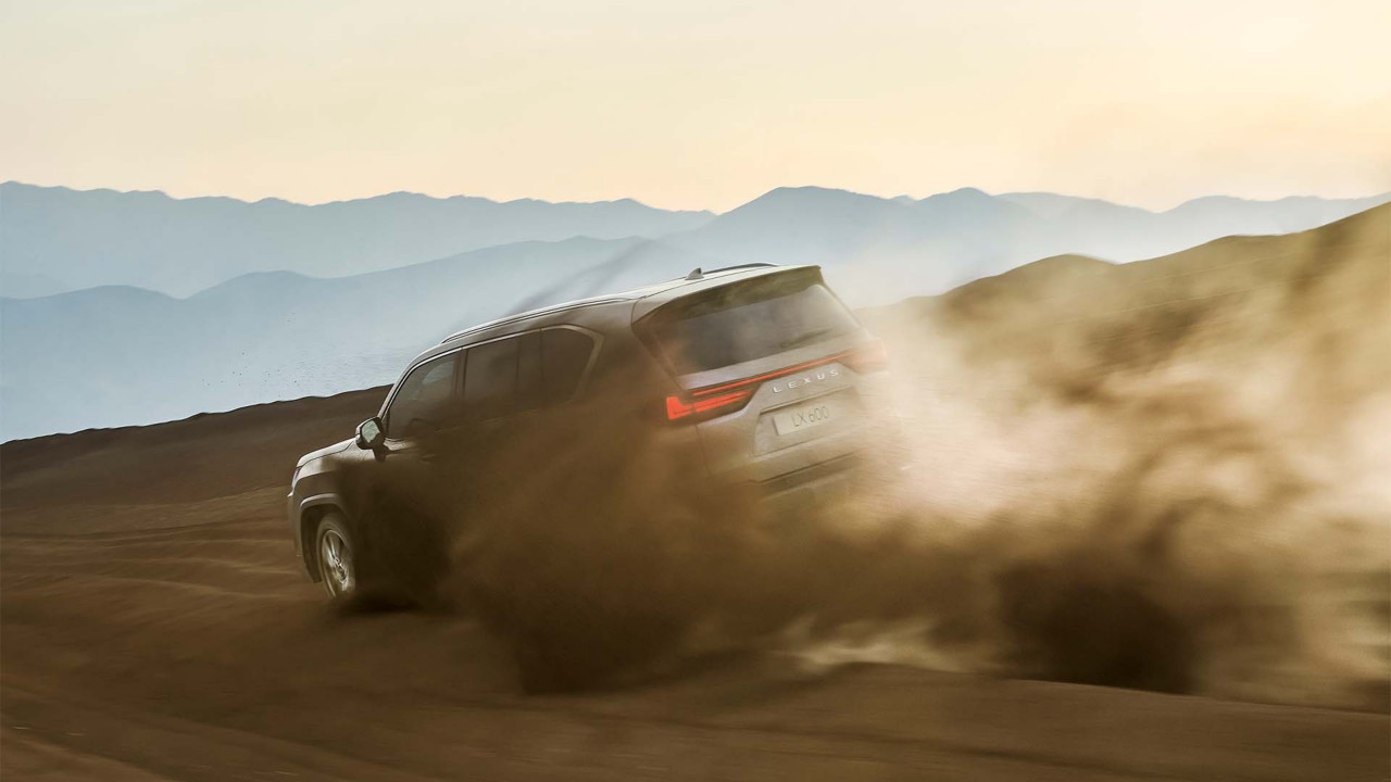 Lexus LX driving off-road in a desert 